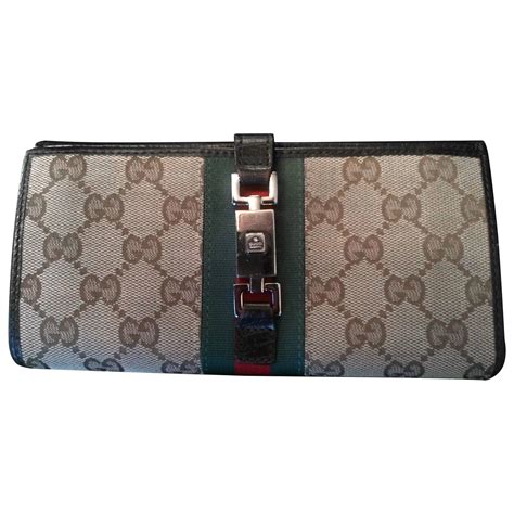 gucci wallet hand clasp|Gucci authentic wallet.